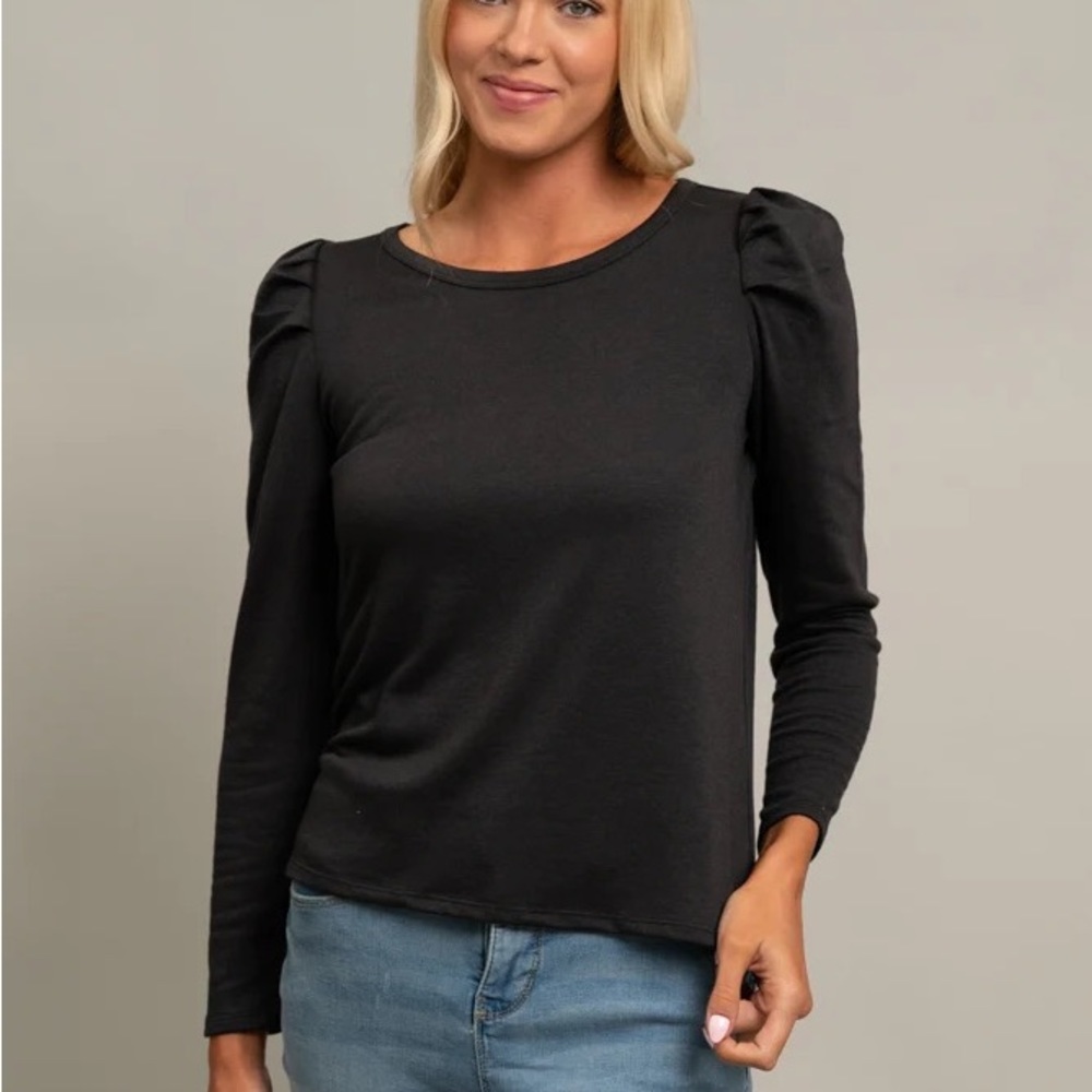 Size Large Cyrus French Terry with puff sleeves. Fits size 10/12